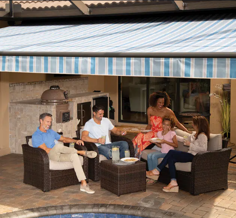 retractable awning extended over backyard patio