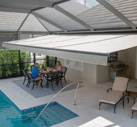 retractable awning extended over backyard patio