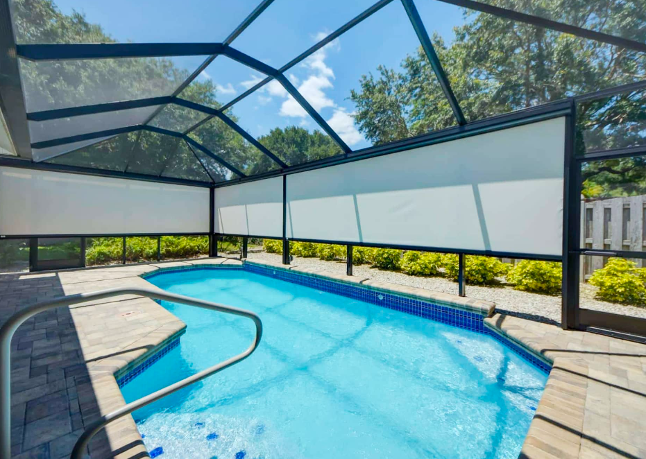 pool enclosure with retractable screens for shade